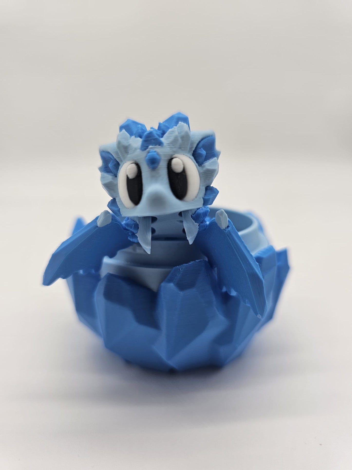 Jucarie Articulata Dragon Gheata cu Ou Decorativ - Figurina Flexibila Fidget